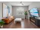 Cozy living room featuring stylish furnishings and hardwood flooring at 13319 Deep Blue Pl, Bradenton, FL 34211