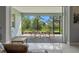 Serene screened patio with stylish seating, offering a tranquil outdoor living space at 13319 Deep Blue Pl, Bradenton, FL 34211
