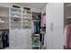 Spacious walk-in closet with custom shelving, drawers, and ample storage space at 14210 9Th Ne Ter, Bradenton, FL 34212