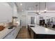 Well-equipped kitchen featuring modern appliances, custom cabinets, and a stylish design at 14210 9Th Ne Ter, Bradenton, FL 34212
