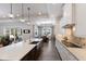 Spacious kitchen with an island and a seamless transition to the dining and outdoor living areas at 14210 9Th Ne Ter, Bradenton, FL 34212