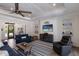 Inviting living room with a comfortable seating arrangement and coastal-themed decor at 14210 9Th Ne Ter, Bradenton, FL 34212