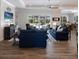 Comfortable living room featuring a ceiling fan, backyard views and an open floorplan at 14210 9Th Ne Ter, Bradenton, FL 34212
