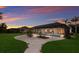 Well-manicured backyard leading to a screened-in pool and patio area, great for outdoor entertaining at 14210 9Th Ne Ter, Bradenton, FL 34212