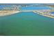 Capture the view of a massive lake stretching across a planned community with a single Gathering homes at 16148 Preservation Blvd, Punta Gorda, FL 33982