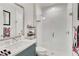 Modern bathroom featuring a walk-in shower, vanity sink, and elegant finishes at 16148 Preservation Blvd, Punta Gorda, FL 33982