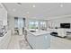 Gourmet kitchen featuring a large island and an open layout with easy access to the living space at 16148 Preservation Blvd, Punta Gorda, FL 33982