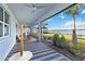 Inviting lanai with comfortable seating and panoramic views of the lake and backyard at 16148 Preservation Blvd, Punta Gorda, FL 33982