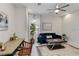 Cozy living room featuring a desk, comfortable seating, and stylish decor at 16148 Preservation Blvd, Punta Gorda, FL 33982