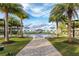 A beautifully landscaped park with palm trees and a splash pad for families to enjoy at 16148 Preservation Blvd, Punta Gorda, FL 33982