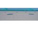 Scenic beachfront with turquoise umbrellas offering shade on the pristine white sand at 1701 Gulf Of Mexico Dr # 502, Longboat Key, FL 34228