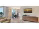 Charming dining area with ocean views, modern lighting, and stylish furnishings for a comfortable dining experience at 1701 Gulf Of Mexico Dr # 502, Longboat Key, FL 34228