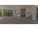 Welcoming building entrance featuring modern doors and lush landscaping at 1701 Gulf Of Mexico Dr # 502, Longboat Key, FL 34228