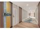 Modern hallway with contemporary design elements, decorative panels, and elegant lighting fixtures at 1701 Gulf Of Mexico Dr # 502, Longboat Key, FL 34228