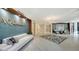 Bright and airy lobby area with modern design elements including tile floors and designer touches at 1701 Gulf Of Mexico Dr # 502, Longboat Key, FL 34228