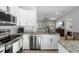 Modern kitchen with stainless steel appliances and granite countertops at 1709 Kerman St, North Port, FL 34288