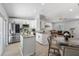 Bright, open kitchen features stainless steel appliances and granite countertops at 1709 Kerman St, North Port, FL 34288