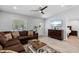 Bright living room featuring a comfortable seating area and modern decor at 1709 Kerman St, North Port, FL 34288