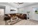 Comfortable living room with a large sectional sofa and stylish accents at 1709 Kerman St, North Port, FL 34288