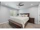 Spacious main bedroom with a ceiling fan and a window allowing ample natural light at 1709 Kerman St, North Port, FL 34288