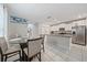Open concept dining area adjacent to the kitchen, featuring a table with seating for four at 1723 Fred Ives St, Ruskin, FL 33570
