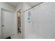 Bright shower area with tiled walls, showcasing a clean and functional space for daily routines at 1723 Fred Ives St, Ruskin, FL 33570