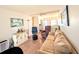 Living room with fan and views of the dining room and foyer at 1819 Restful Dr # N25, Bradenton, FL 34207