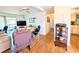 View of living room with dining area and kitchen in the background at 1819 Restful Dr # N25, Bradenton, FL 34207
