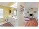 Bathroom featuring marble vanity, framed mirror and a sun tunnel at 1836 Ironwood Ct, Venice, FL 34293