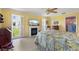 Bright bedroom offers a fireplace, outdoor access, and tiled floors at 1836 Ironwood Ct, Venice, FL 34293