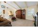 Bright and airy living room with vaulted ceiling and large windows at 1836 Ironwood Ct, Venice, FL 34293