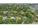 Drone shot of the property in a lush, walkable neighborhood close to town with shopping and restaurants at 1931 Bahia Vista St, Sarasota, FL 34239