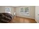 Simple bedroom with hardwood floors, and natural light at 1931 Bahia Vista St, Sarasota, FL 34239