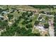 Bird's eye view of properties with lush landscaping and long private driveways at 2040 Edmondson Rd, Nokomis, FL 34275