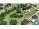 Aerial view of home with mature trees and plenty of yard space for all your outdoor needs at 2040 Edmondson Rd, Nokomis, FL 34275