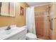 Bathroom featuring a shower with tile surround and a white shower curtain at 2040 Edmondson Rd, Nokomis, FL 34275