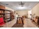This is a view of the garage with shelving, a table, washer and dryer and other storage items at 2040 Edmondson Rd, Nokomis, FL 34275