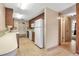 This kitchen features traditional wood cabinetry and appliances at 2040 Edmondson Rd, Nokomis, FL 34275