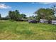 The house has a very big yard and a truck parked on it at 2040 Edmondson Rd, Nokomis, FL 34275