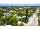 Charming neighborhood with tropical landscaping and well-maintained homes located near the ocean at 205 Elm Ave, Anna Maria, FL 34216