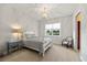 Cozy bedroom featuring carpet, white furniture, and lots of natural light at 20706 79Th E Ave, Bradenton, FL 34202