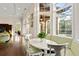 Charming breakfast nook with a large window, built-in bench, and comfortable seating at 20706 79Th E Ave, Bradenton, FL 34202