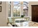 Bright breakfast nook with bay window, built-in seating, and stylish decor at 20706 79Th E Ave, Bradenton, FL 34202