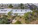 Aerial view of building featuring multiple units and parking spaces at 21300 Brinson Ave # 214, Port Charlotte, FL 33952