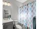 Well-lit bathroom features a shower/tub combo and modern vanity with ample storage at 224 Caserta Ct, Nokomis, FL 34275