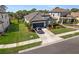 Beautiful one-story home featuring a well-manicured lawn and attached two-car garage at 224 Caserta Ct, Nokomis, FL 34275