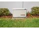 Generac generator for home backup power, surrounded by greenery and mulch at 224 Caserta Ct, Nokomis, FL 34275