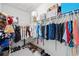 Organized walk-in closet features shelves, hanging racks, and storage for shoes and accessories at 224 Caserta Ct, Nokomis, FL 34275
