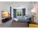 Well-lit bedroom with large windows, carpet, stylish wallpaper and comfortable furniture at 2365 Novus St, Sarasota, FL 34237