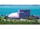Majestic view of the Van Wezel Performing Arts Hall, a landmark with a unique purple exterior near the waterfront at 2365 Novus St, Sarasota, FL 34237